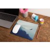 mockup of a mousepad lying on a rustic table next to a flower vase 27554 (93)