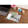 mockup of a mousepad lying on a rustic table next to a flower vase 27554 (5)