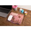mockup of a mousepad lying on a rustic table next to a flower vase 27554 (34)