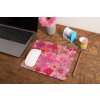 mockup of a mousepad lying on a rustic table next to a flower vase 27554 (36)