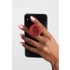 mockup of a hand holding a phone with a phone grip on a plain background 28169 (90)