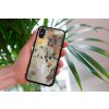 mockup of a woman holding a clear phone case in front of a houseplant 4636 el1 2023 09 08T093942.466