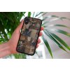 mockup of a woman holding a clear phone case in front of a houseplant 4636 el1 2023 09 08T100519.597