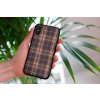 mockup of a woman holding a clear phone case in front of a houseplant 4636 el1 2023 09 08T100917.872