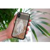 mockup of a woman holding a clear phone case in front of a houseplant 4636 el1 2023 09 08T094447.720