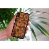 mockup of a woman holding a clear phone case in front of a houseplant 4636 el1 2023 09 08T104523.220
