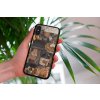 mockup of a woman holding a clear phone case in front of a houseplant 4636 el1 2023 09 08T093719.898