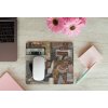 mousepad mockup over a wooden surface by some flowers and a laptop 27560