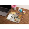 mockup of a mousepad lying on a rustic table next to a flower vase 27554 (2)
