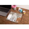 mockup of a mousepad lying on a rustic table next to a flower vase 27554 (3)