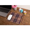 mockup of a mousepad lying on a rustic table next to a flower vase 27554 (12)