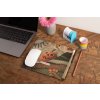 mockup of a mousepad lying on a rustic table next to a flower vase 27554 (41)