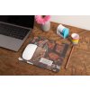 mockup of a mousepad lying on a rustic table next to a flower vase 27554 (43)