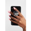 mockup of a hand holding a phone with a phone grip on a plain background 28169