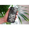 mockup of a woman holding a clear phone case in front of a houseplant 4636 el1 2023 09 21T115801.253
