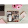 mousepad mockup over a wooden surface by some flowers and a laptop 27560
