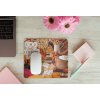 mousepad mockup over a wooden surface by some flowers and a laptop 27560