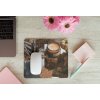 mousepad mockup over a wooden surface by some flowers and a laptop 27560