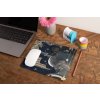 mockup of a mousepad lying on a rustic table next to a flower vase 27554 (13)