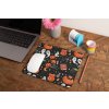 mockup of a mousepad lying on a rustic table next to a flower vase 27554 (2)