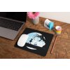 mockup of a mousepad lying on a rustic table next to a flower vase 27554 (35)