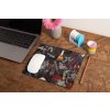 mockup of a mousepad lying on a rustic table next to a flower vase 27554 (37)
