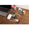 mockup of a mousepad lying on a rustic table next to a flower vase 27554 (39)