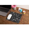 mockup of a mousepad lying on a rustic table next to a flower vase 27554 (43)