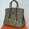 Icona 25 Handbag in Togo Leather