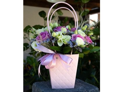A gift bag full of flowers