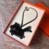 Hermès černý Rodeo Robeo Plush PM