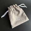 Dior dust bag 15,5x12 cm šedý