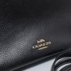 Coach crossbody kožená kabelka černá nošená
