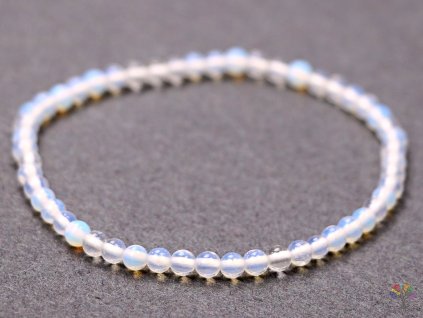Bransoletka z białym opalitem - kulki 4 mm #95 - syntetyczna