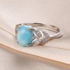 10038 strieborný prsteň s oválnym tyrkysovým kameňom a zirkónmi len na maju
