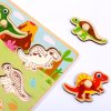 Drevené vkladacie puzzle Dinosaury  Drevené puzzle s úchytkami, 9 dinosaurov
