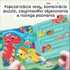 Detail magnetických puzzle Jarmelo Dinosaury počas skladania v ruke dieťaťa