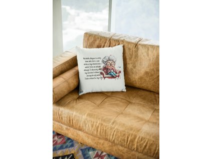 mockup of a square pillow sitting on a leather couch 23551