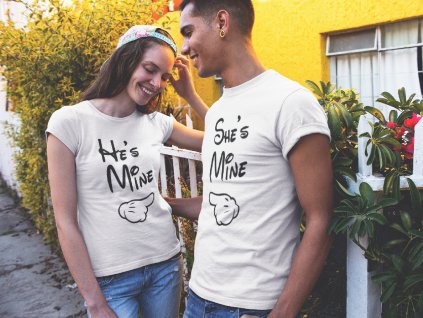 smiling couple in the street wearing round neck t shirts mockup a15797