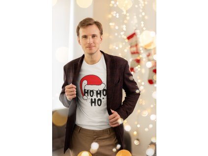 bella canvas tee mockup of a man posing in a xmas decorated setting m30462