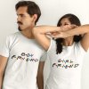 two friends wearing different tshirts mockup while indoors a16215