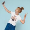 t shirt mockup of a girl taking a selfie in a studio 45056 r el2