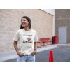 unisex tee mockup of a smiling woman in a parking lot 23040
