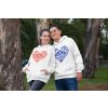 mockup of a smiling couple wearing matching hoodies at the park 30754