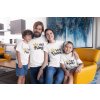 mockup of a family of four wearing t shirts in the living room 28060