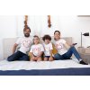 t shirt mockup of a family of four watching tv on a bed 28061 (2)