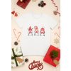 mockup of a t shirt surrounded by christmas presents and decorations 30632