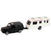 197862 1 sada vozidel jeep s karavanem cerna