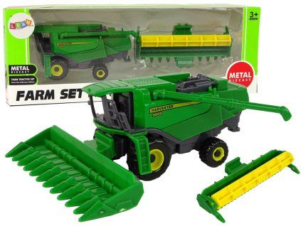 Trattore agricolo con accessorio verde giallo