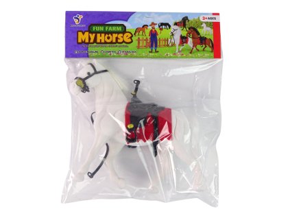 Figurka bílého koně se sedlem